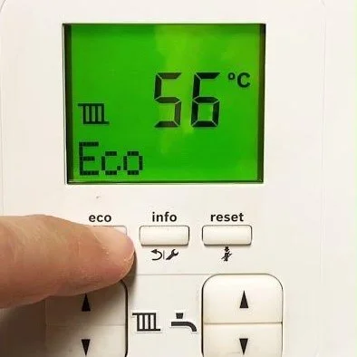 Pushing Eco button on boiler