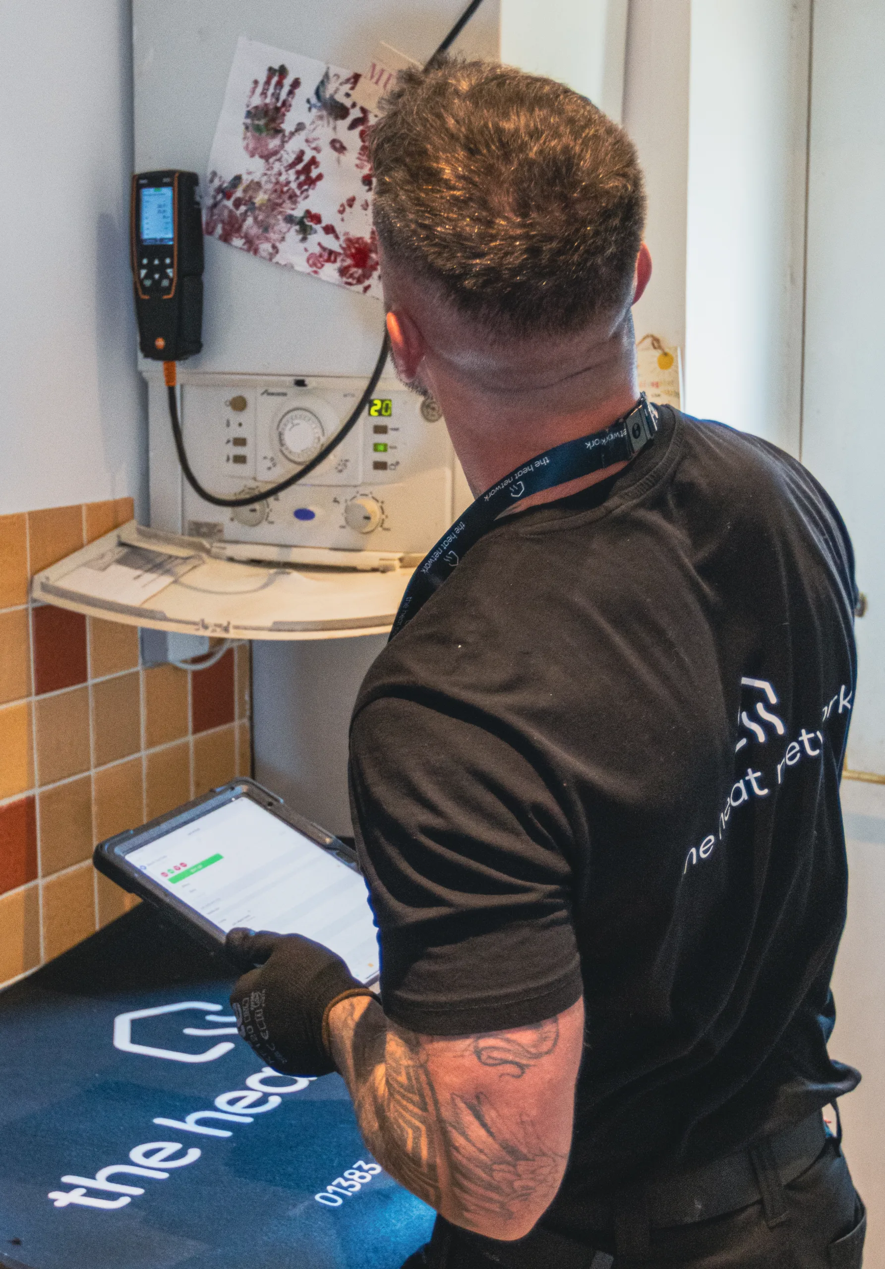 The Heat Club 15 Engineer servicing a boiler