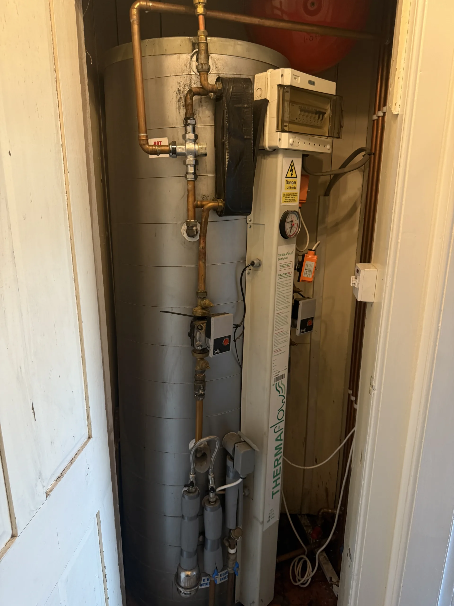 Old electric hot water cylinder before upgrade in Kirkcaldy